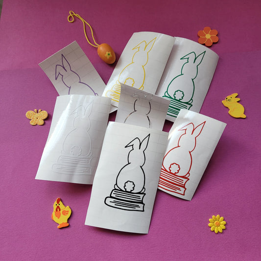 Vinyl-Aufkleber "Hase auf Büchern"