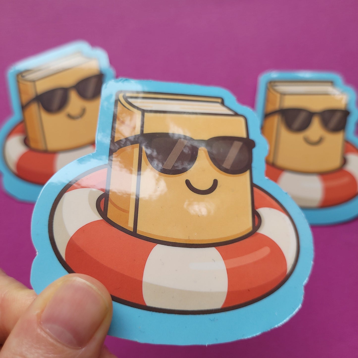 Sticker „Buch im Schwimmring"