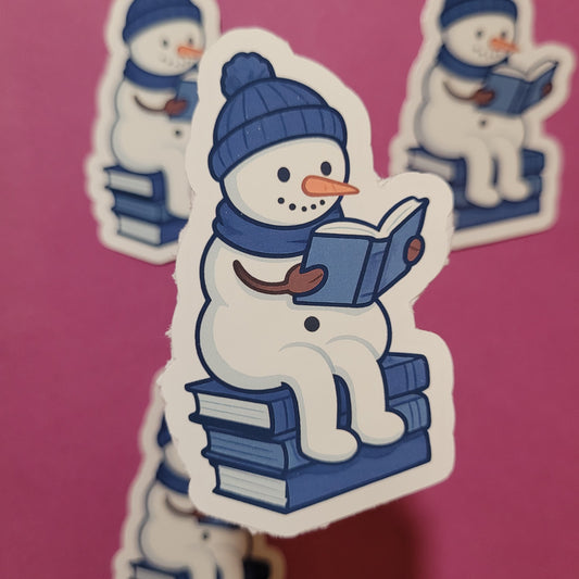 Sticker „Snowy, der lesende Schneemann“